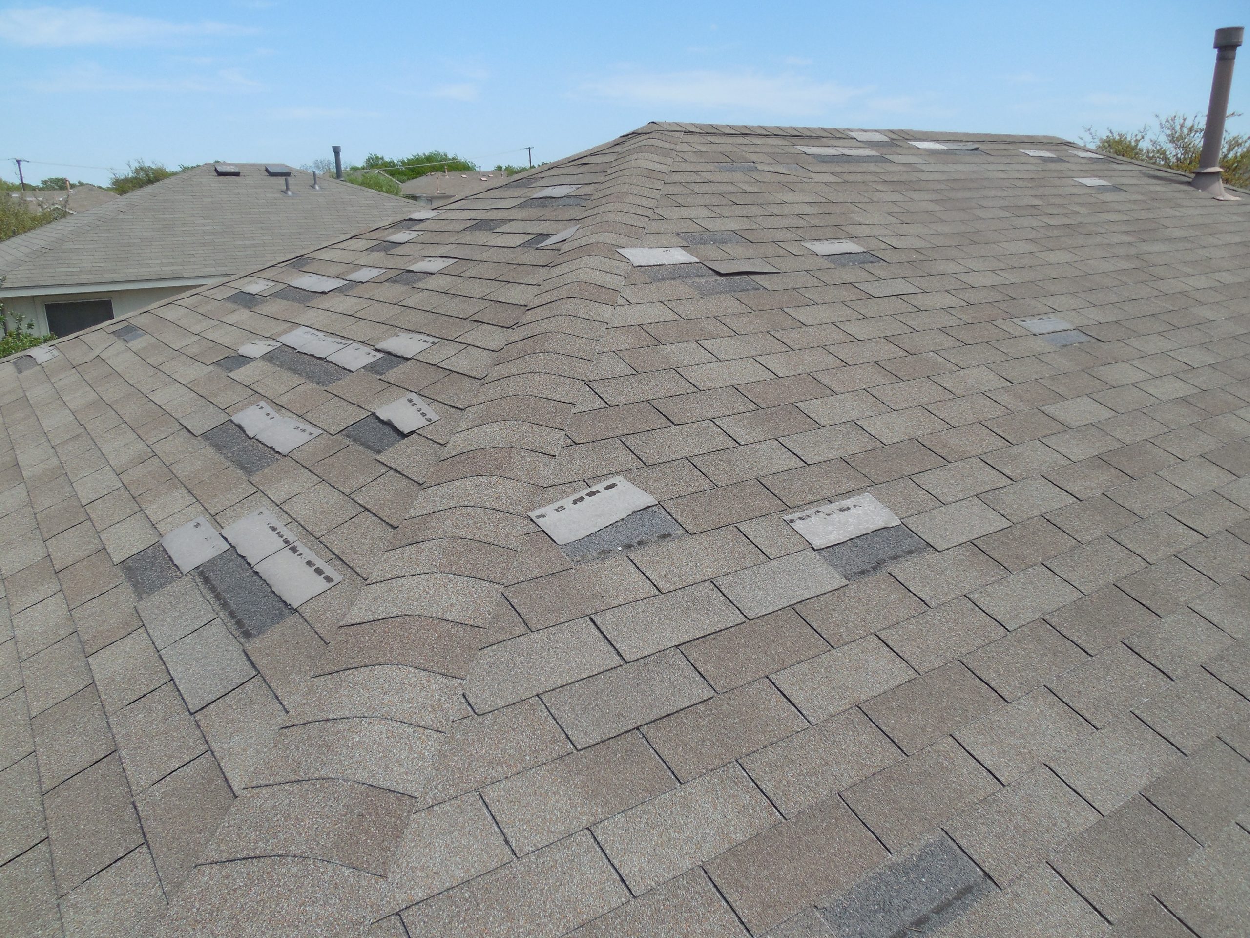 Wind damaged shingles